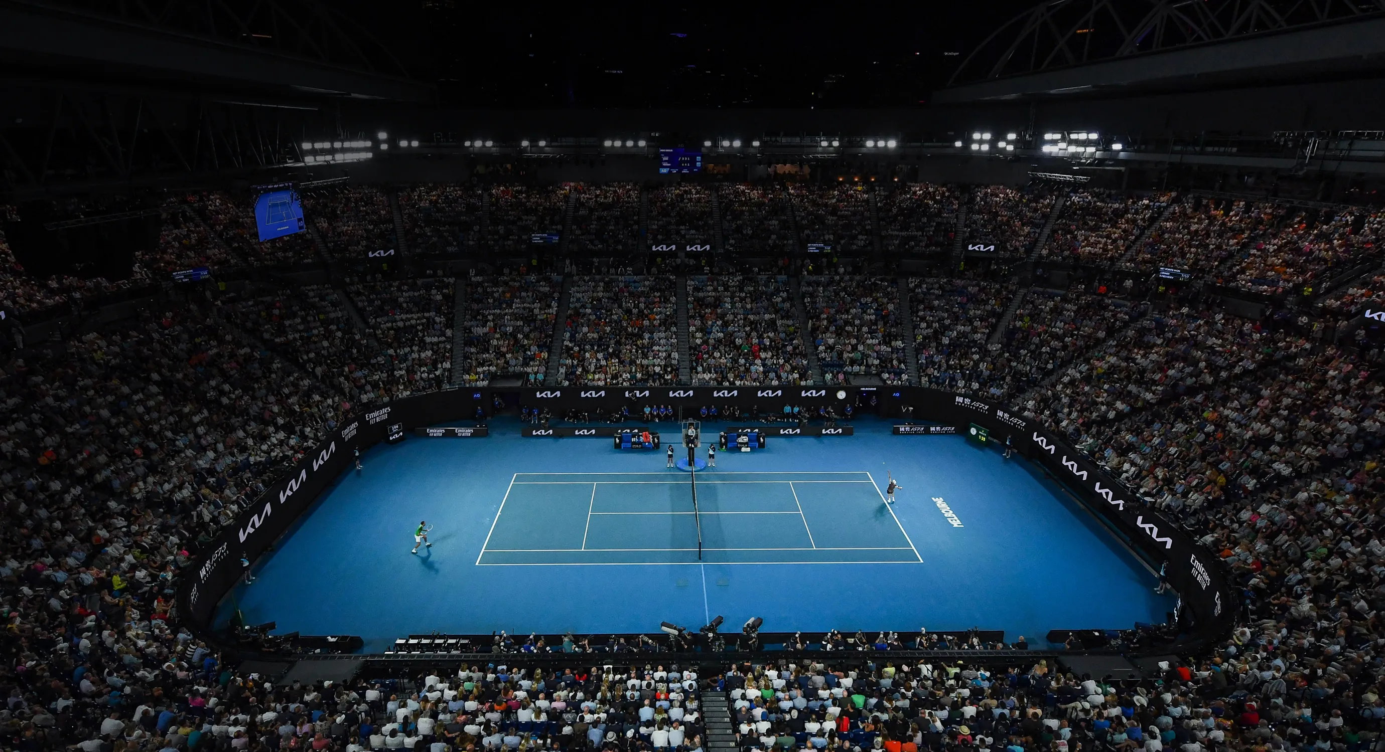 A packed Australian Open main court during a match.