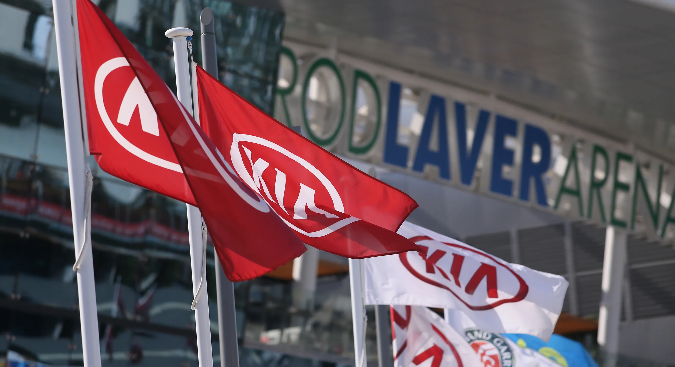 Kia logo flags waving at the Australian Open venue.