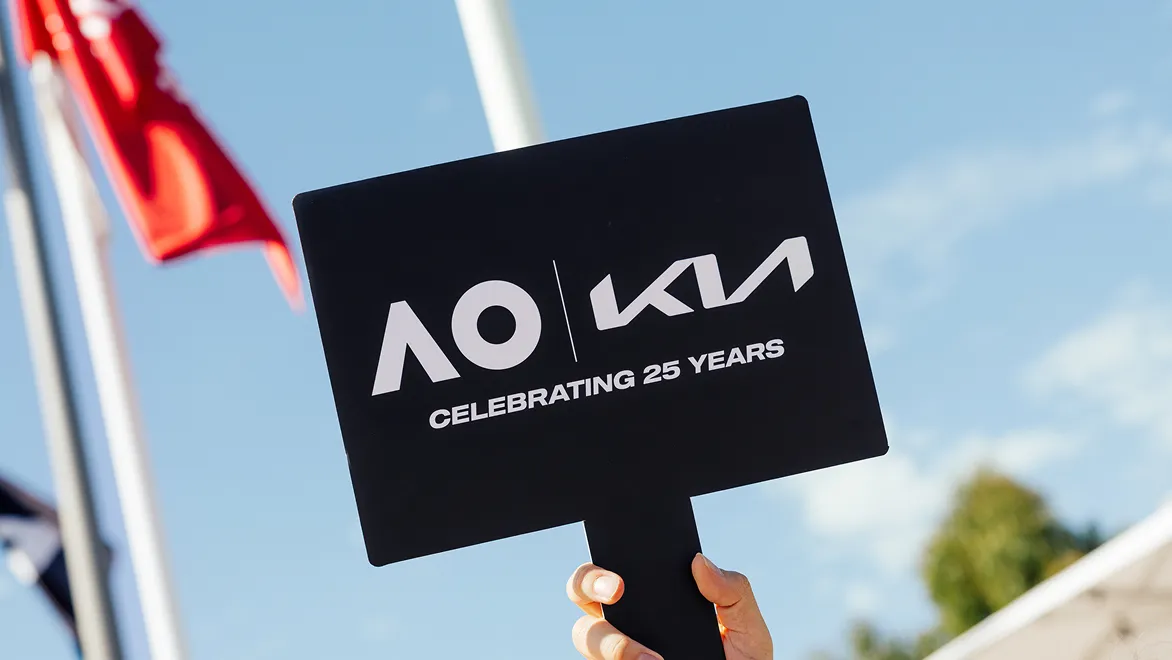 Kia brand exhibition booth and visitors at the AO event