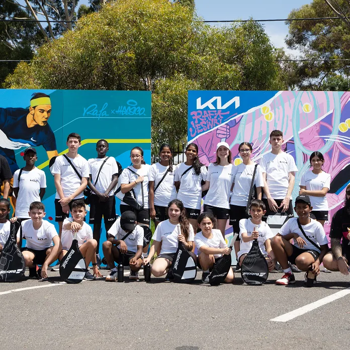 Group photo of participants with Kia at the AO event