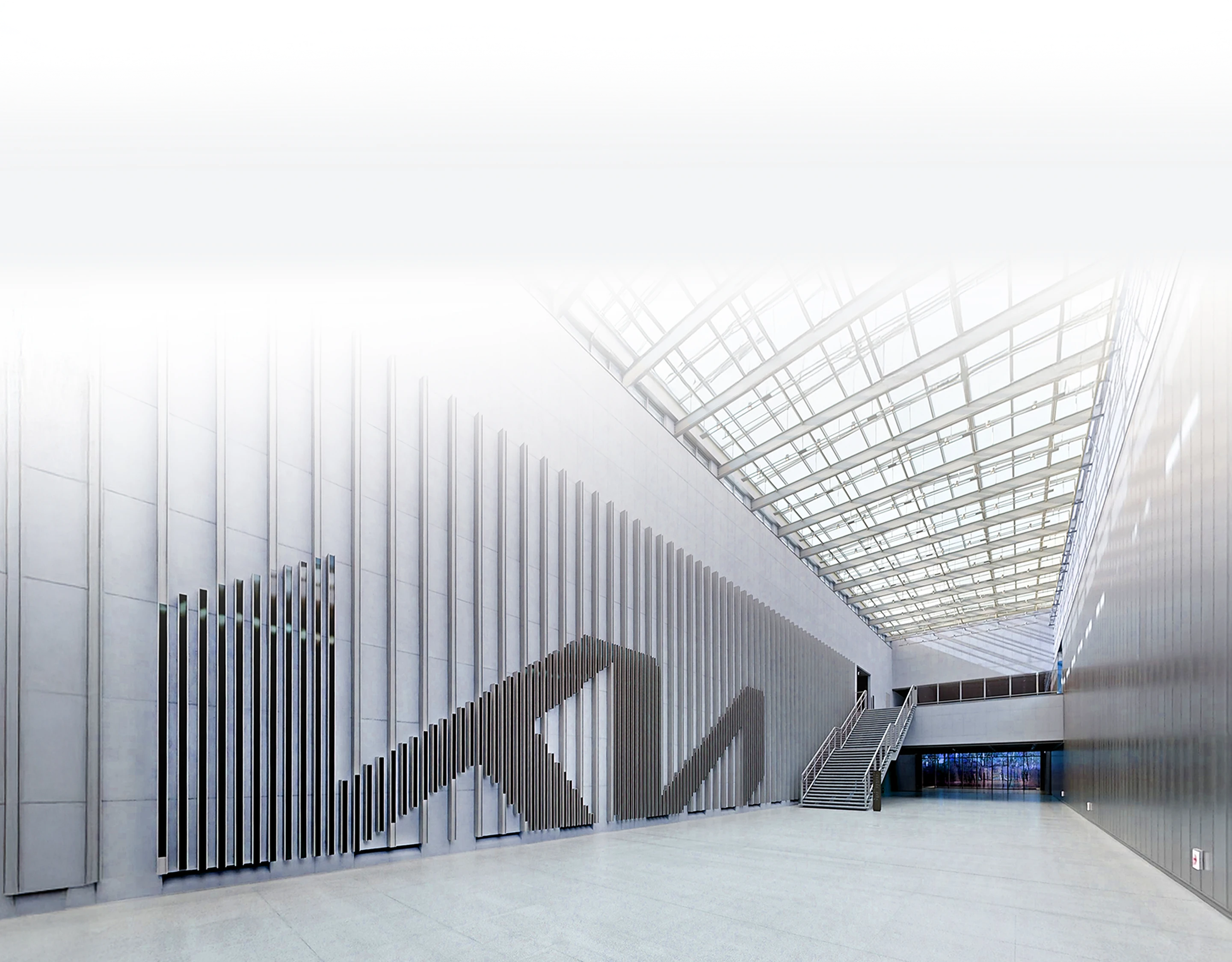 Interior image of the Kia logo wall installation inside the Kia brand experience space Kia360