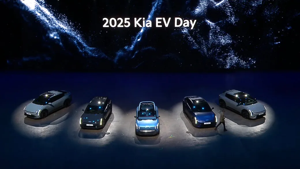 Kia EV4, EV2, EV5 and PBV PV5 vehicles displayed on stage at 2025 Kia EV Day