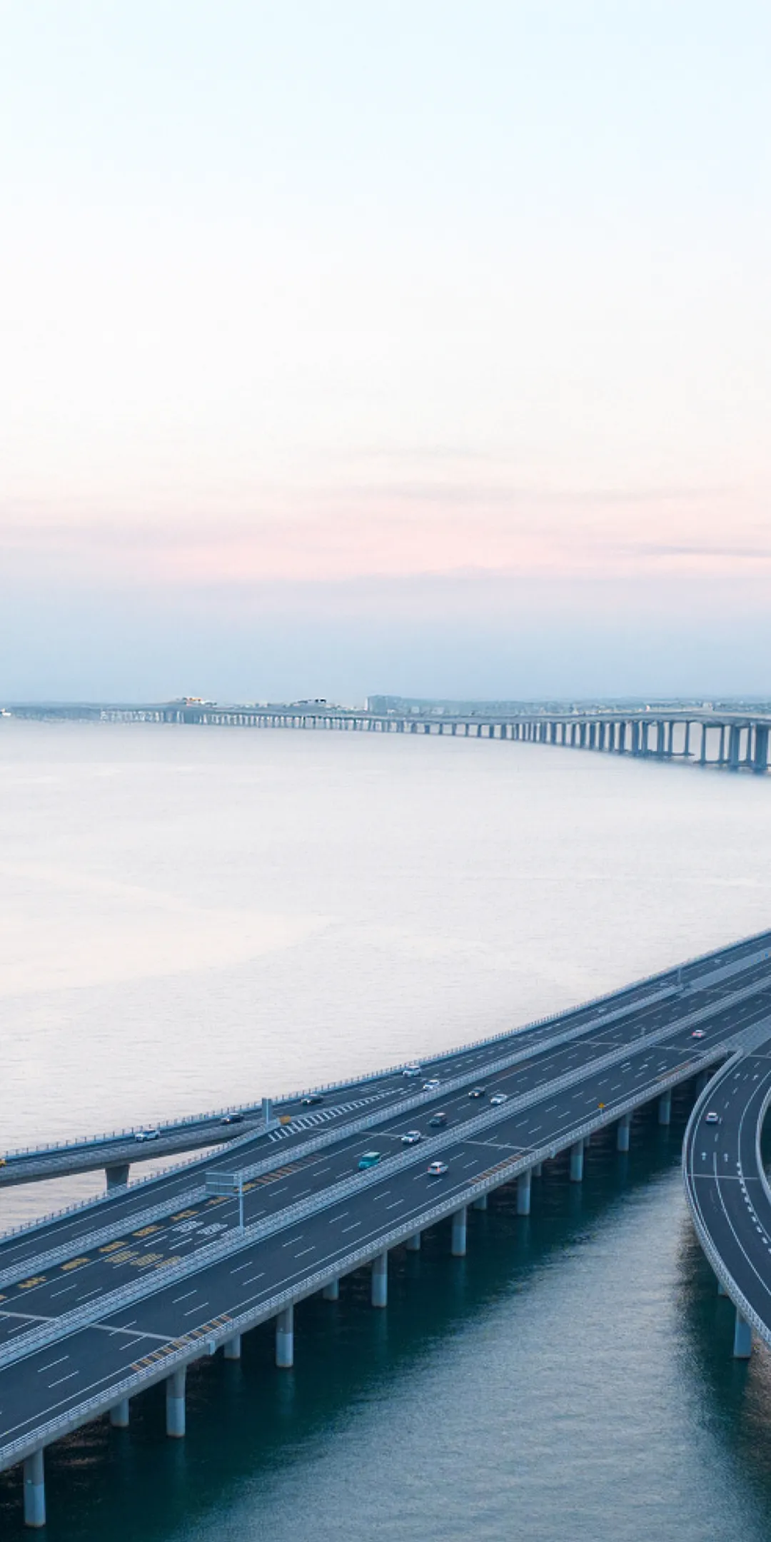 Curved sea bridge spanning across the ocean