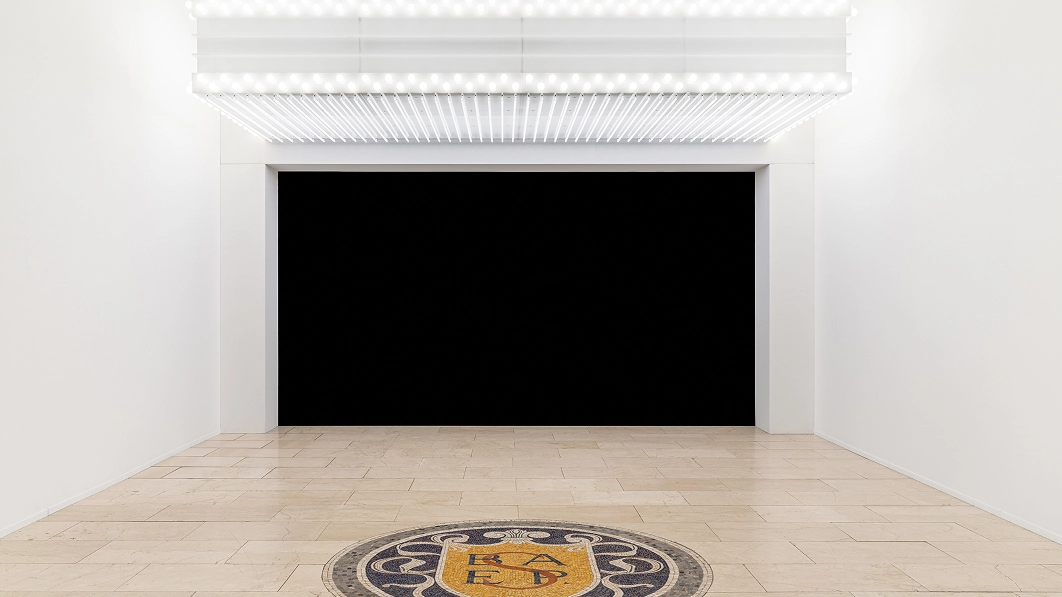 25 exhibition installation with a horizontal lighting structure in 'Eclipse of Perceptions'.