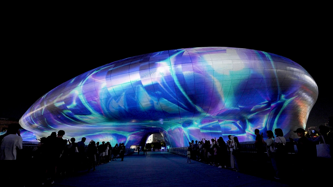 Media projection mapped onto the DDP exterior at Seoul Light 2023.