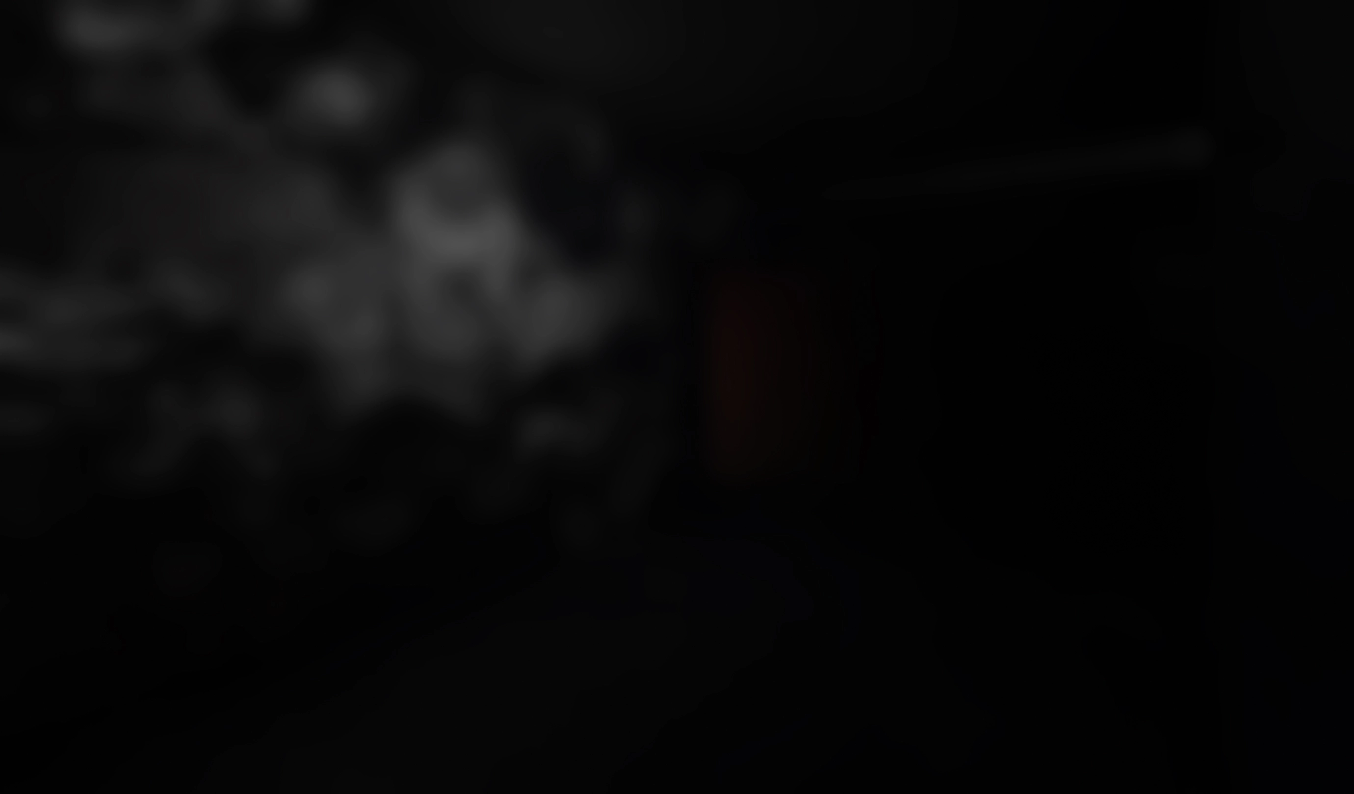 Media installation displaying abstract black-and-white imagery in the Boiling Pot space.