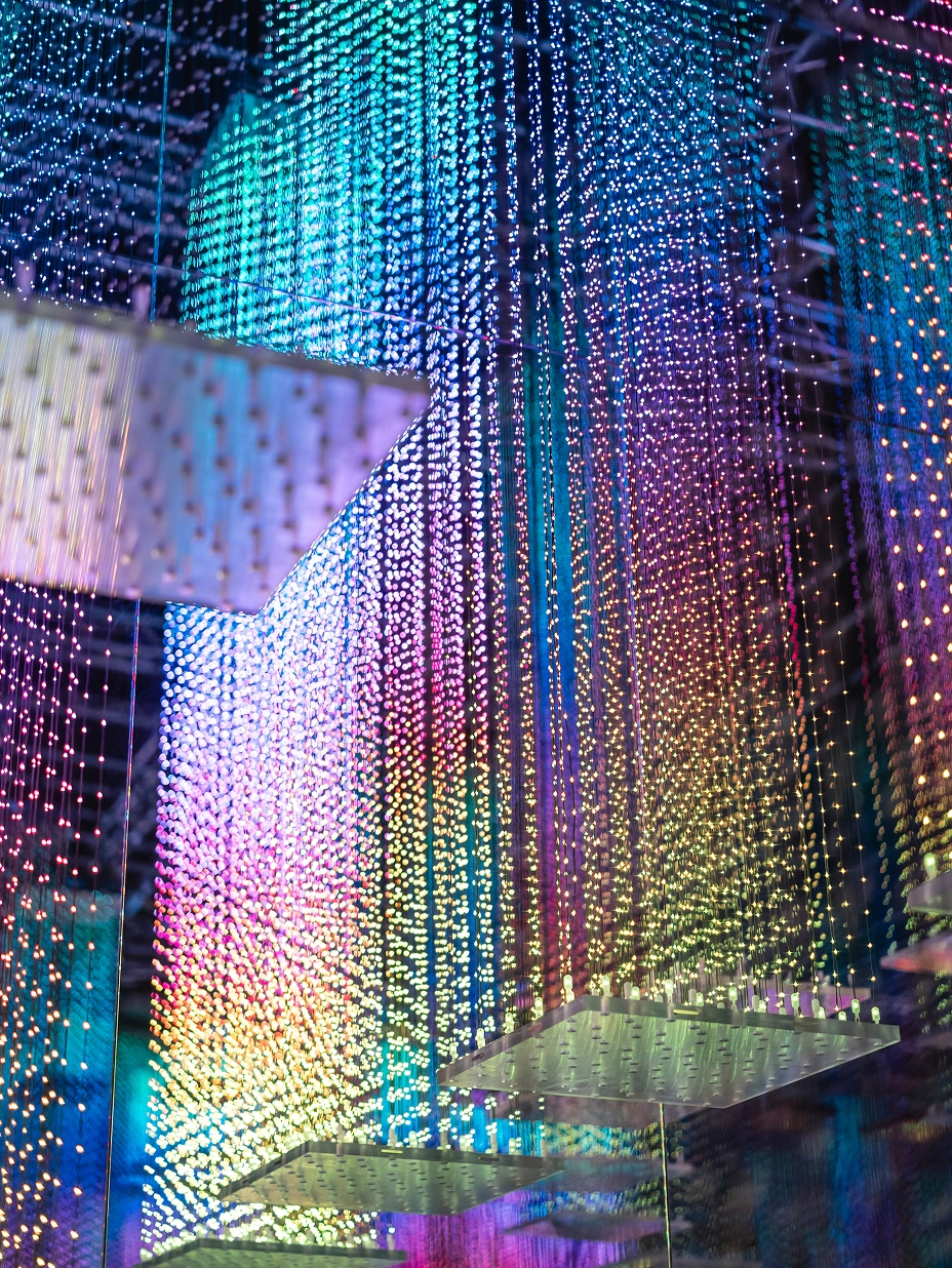 Close-up of blue lighting and digital objects from LedPulse's 'The DragonO Universe.'