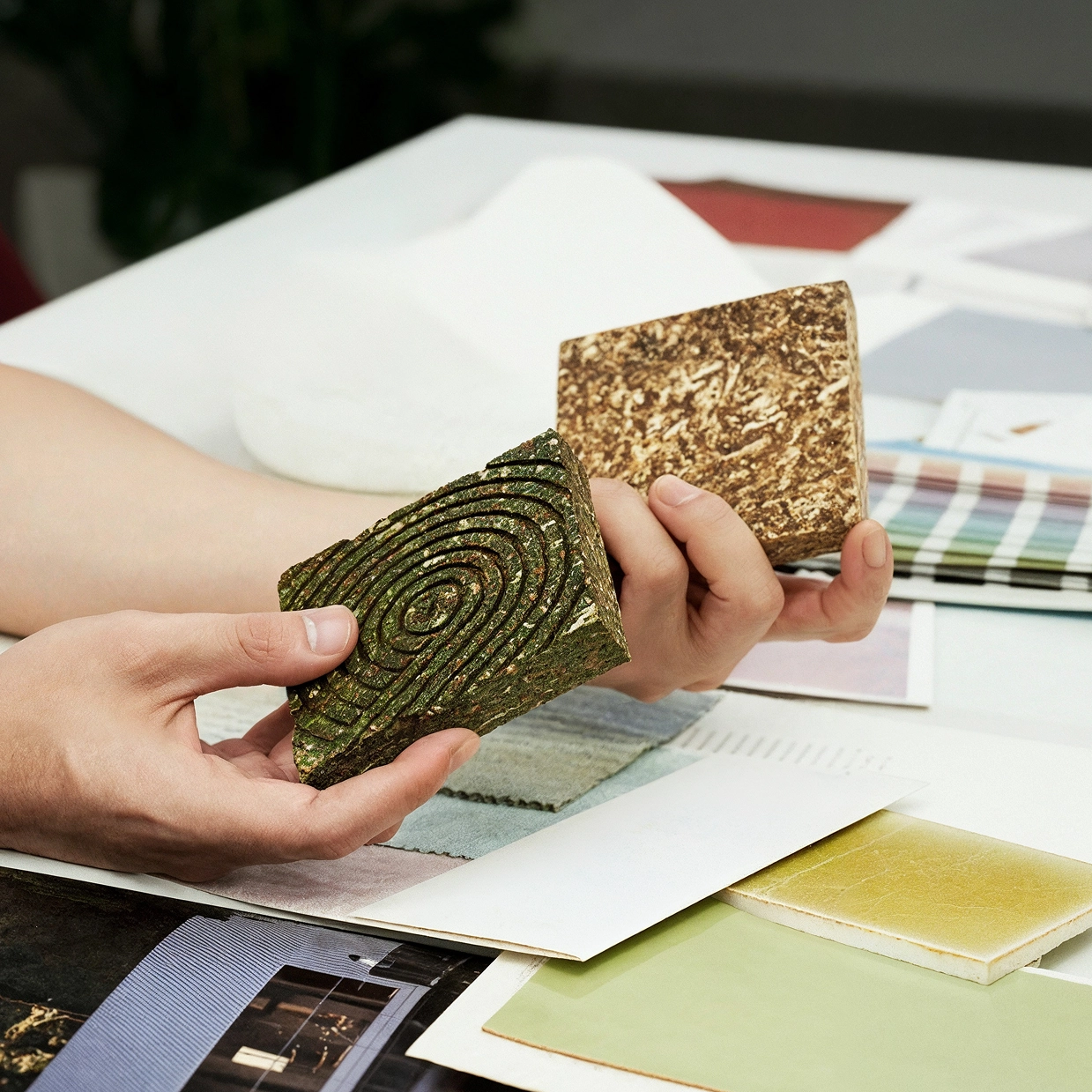 Image of the Kia China CMF team comparing various color and material samples
