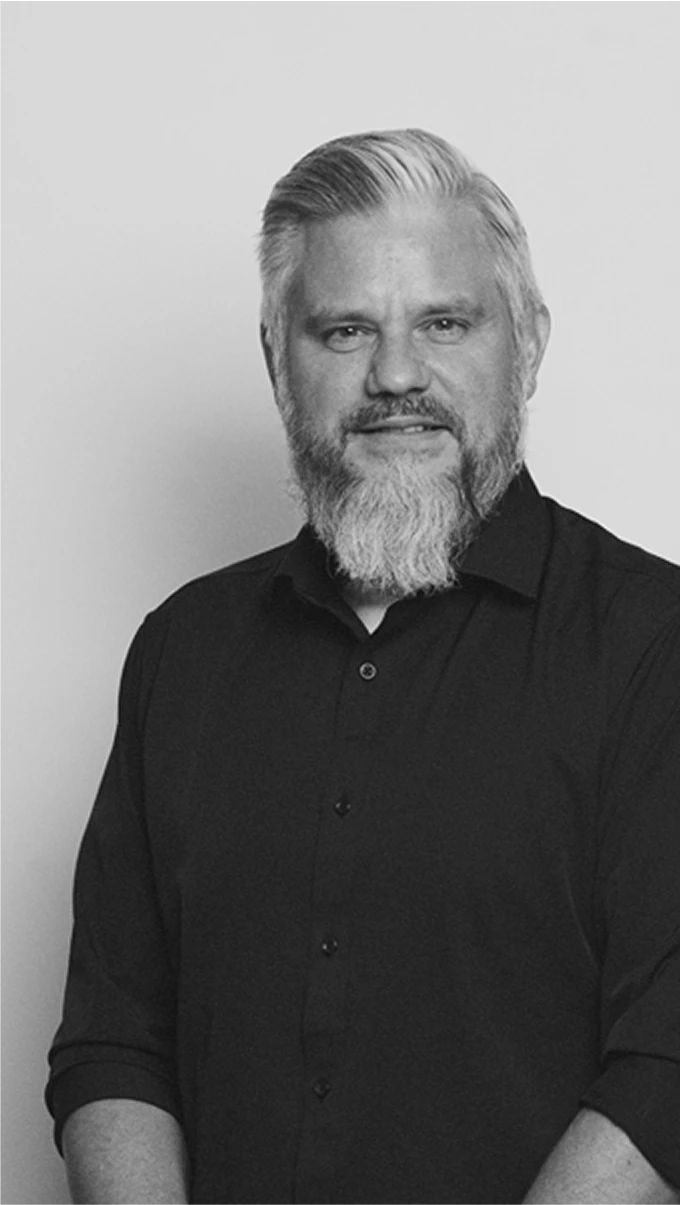 Black-and-white profile portrait of Johan Bates, Head of Kia Rookie Design
