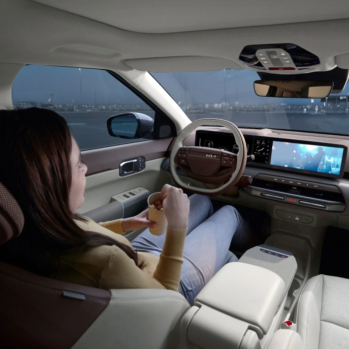 Image of using infotainment inside a Kia EV