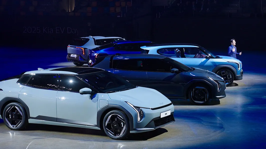 EV4 and PV5 vehicles displayed on stage at 2025 Kia EV Day