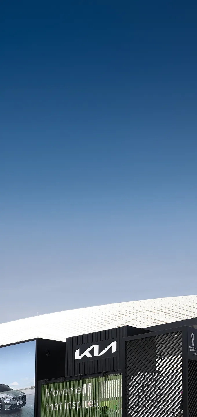 Exterior view of a Kia-branded exhibition space