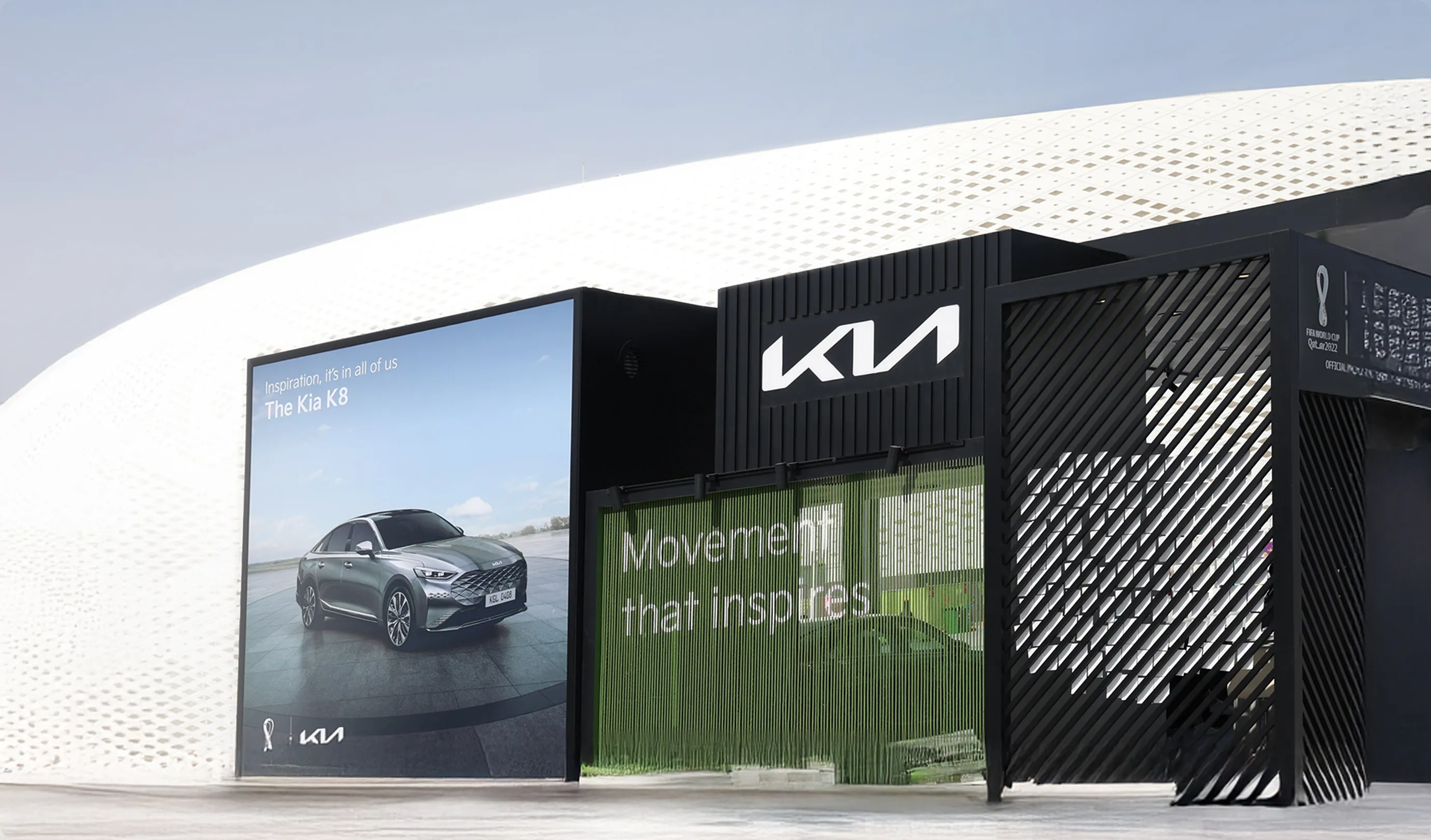 Exterior view of a Kia-branded exhibition space