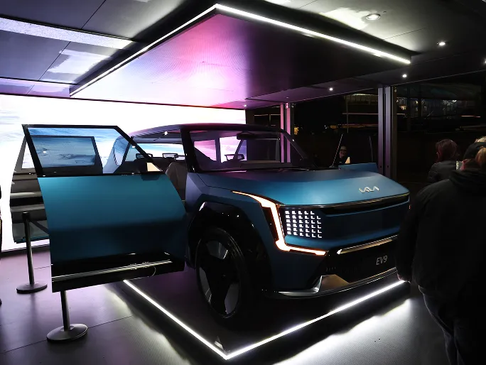 Front view of Kia EV9 displayed in a lit exhibition space