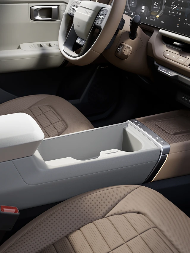 Interior image of a Kia hybrid vehicle showing premium cabin design