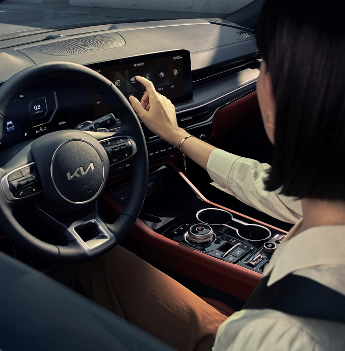 Image of driving from the Kia vehicle driver’s seat