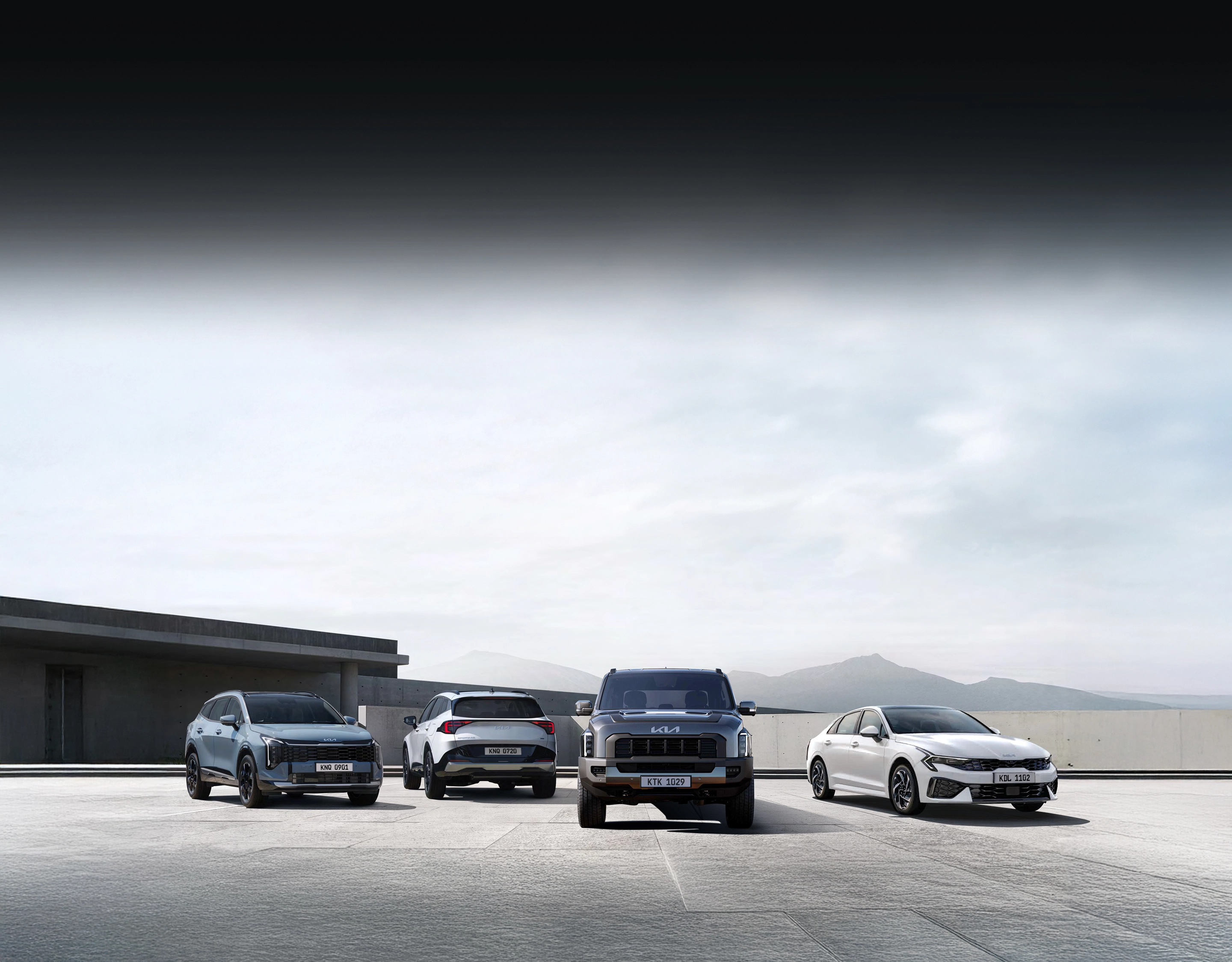 Image showing the Kia vehicle lineup parked together