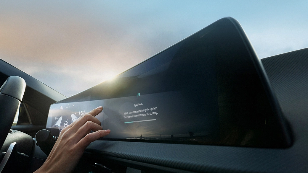 Image showing interaction with the vehicle digital display through touch
