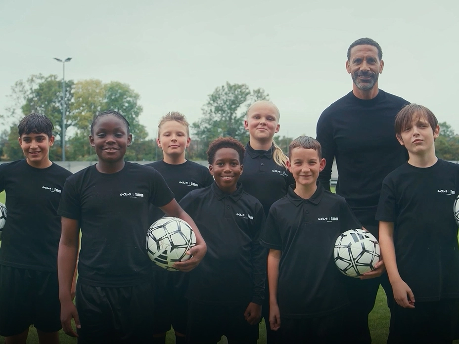 Group image of youth players participating in the FIFA Official Match Ball Carrier program