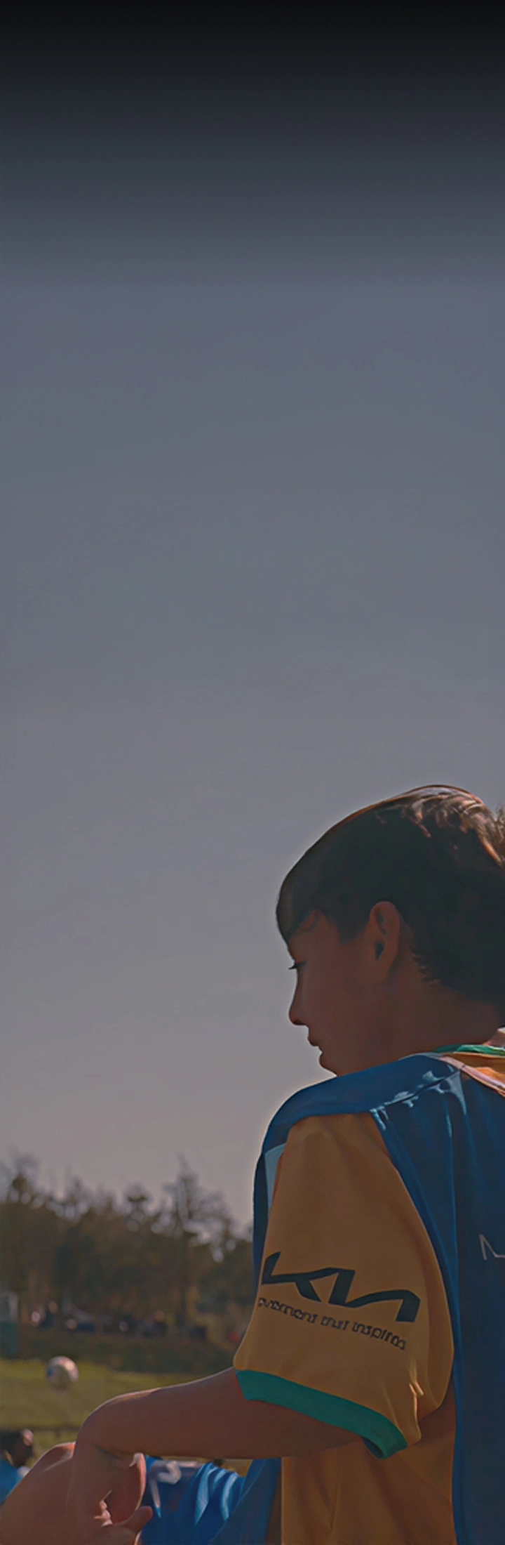 Image of youth players practicing football and dreaming of the future