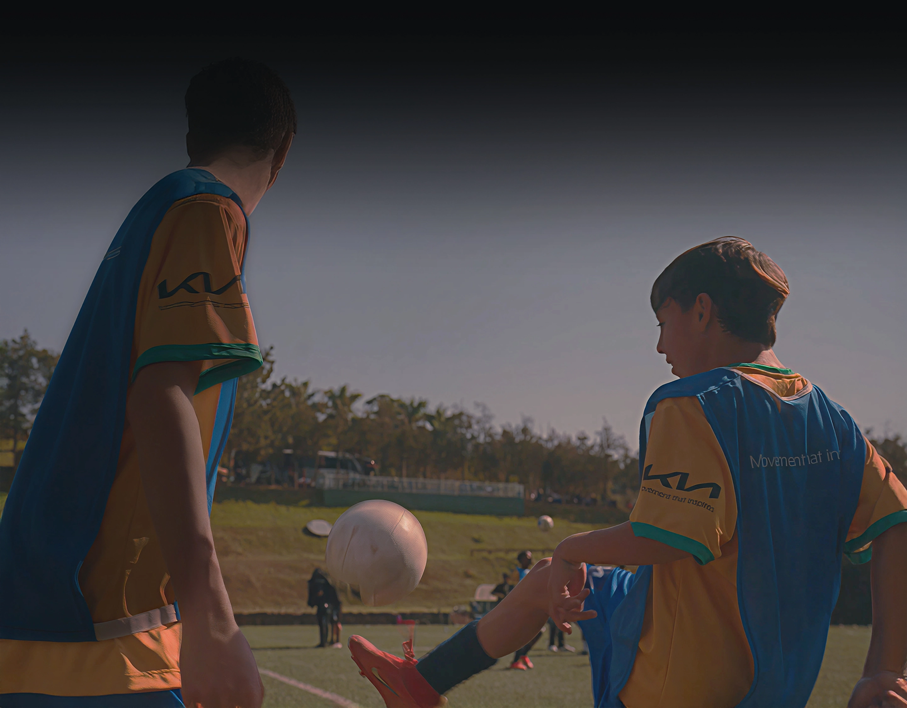 Image of youth players practicing football and dreaming of the future