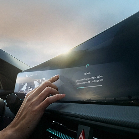 Image showing interaction with a vehicle digital display through touch