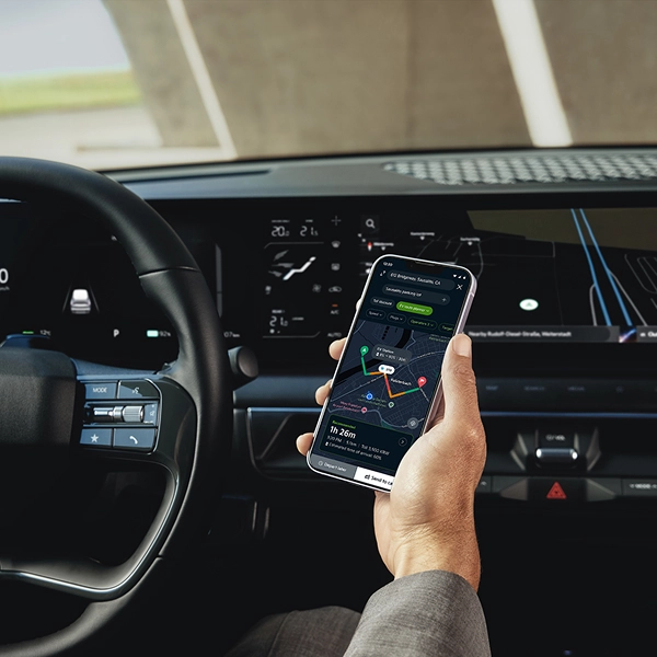 Image showing control of vehicle functions using a smartphone inside the vehicle