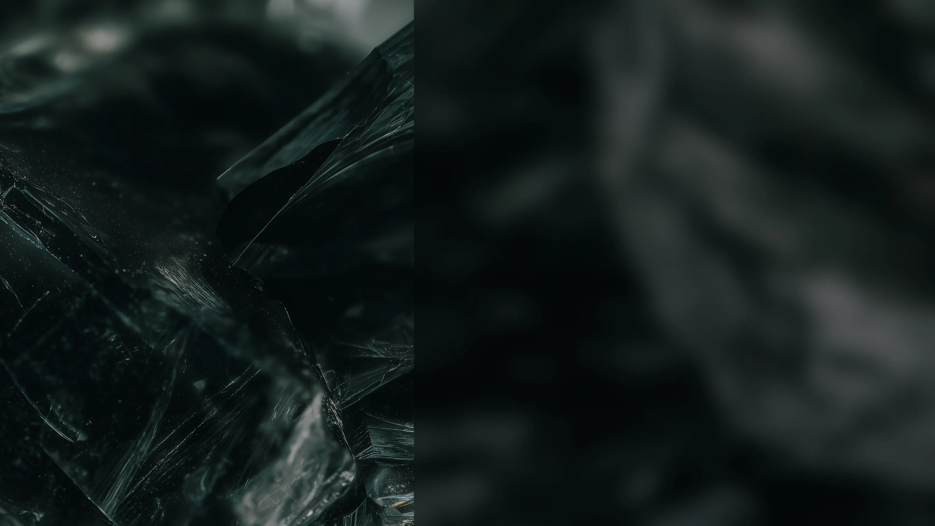 Close-up of black jade infused with a subtle green glow.