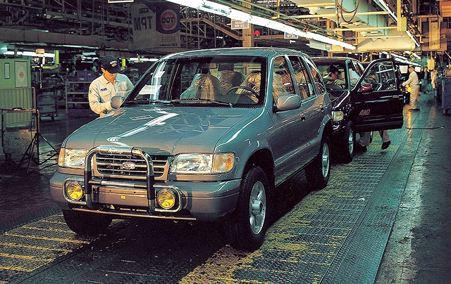 The first-generation Kia Sportage being assembled on a production line