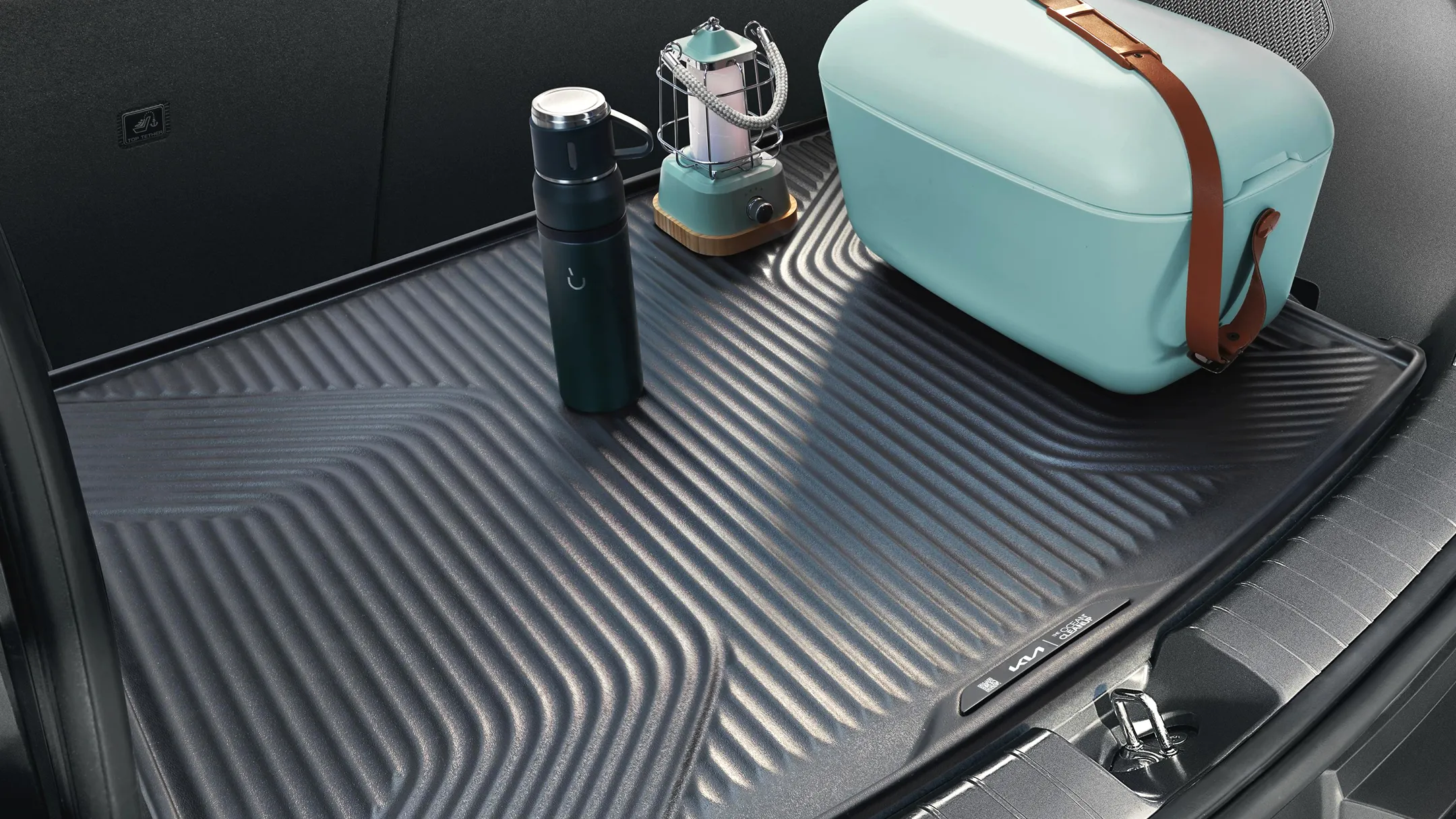 A limited-edition Kia EV3 trunk liner made from recycled plastic